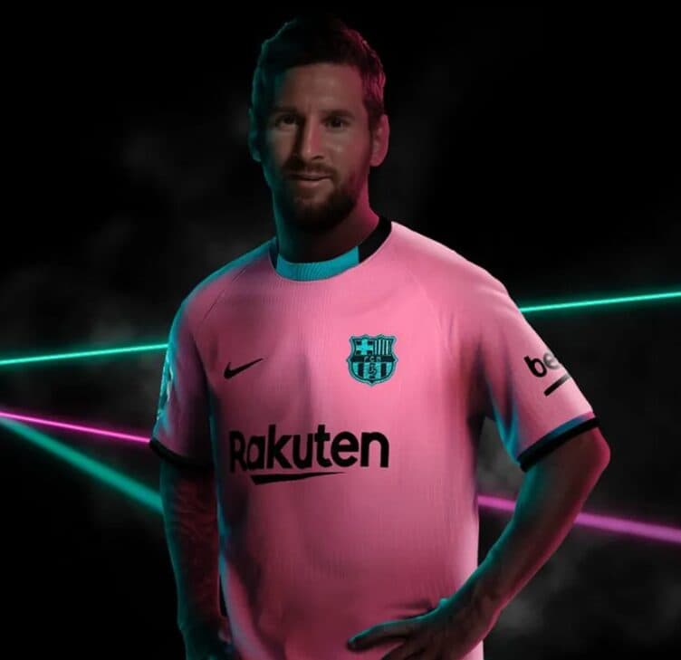 Em uma das camisas rosas que já teve, Barcelona fez lançamento com Messi - Divulgação