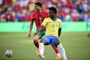 Vinicius Jr e Hakimi em ação: Brasil e Marrocos se enfrentaram no Metlife Stadium, em Nova Jersey, na abertura do grupo C da Copa do Mundo 2026 - Alexandre Battibugli/PLACAR