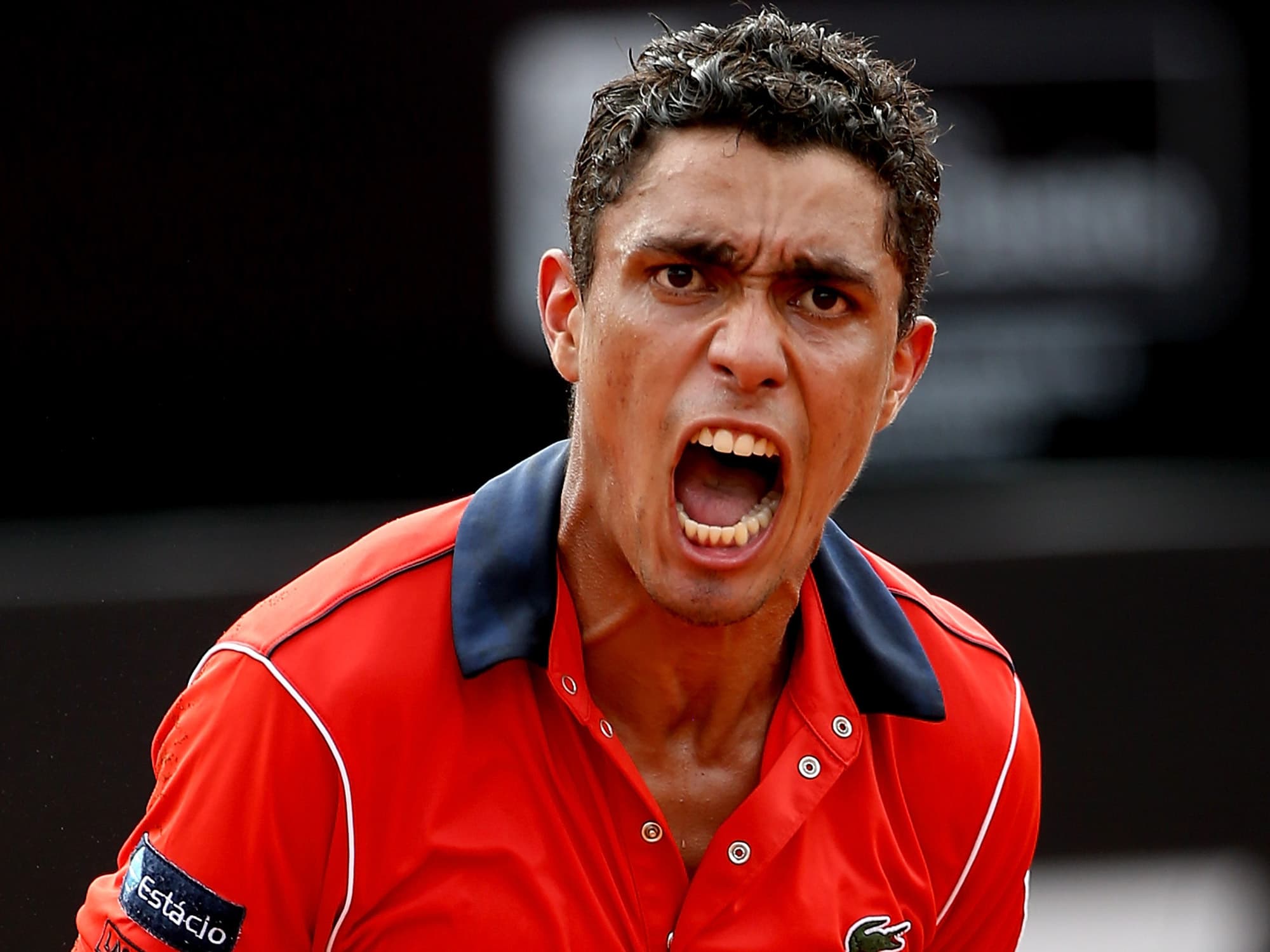 O tenista Thiago Monteiro comemora vitória