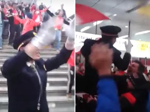 Segurança japonês bem que tentou manter a ordem no metrô, mas acabou nos braços da torcida do River