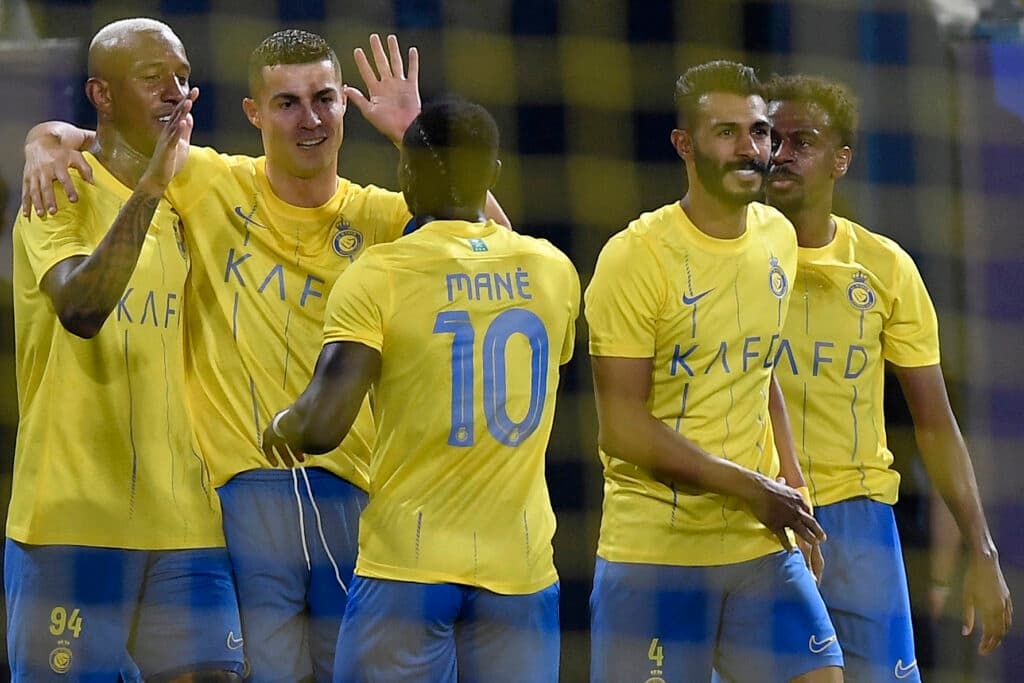Talisca, Cristiano Ronaldo e Mané comemoram gol do Al-Nassr sobre o Shabab Al-Ahli na Liga dos Campeões da Ásia - Yazid Al-Duwihi/AFP