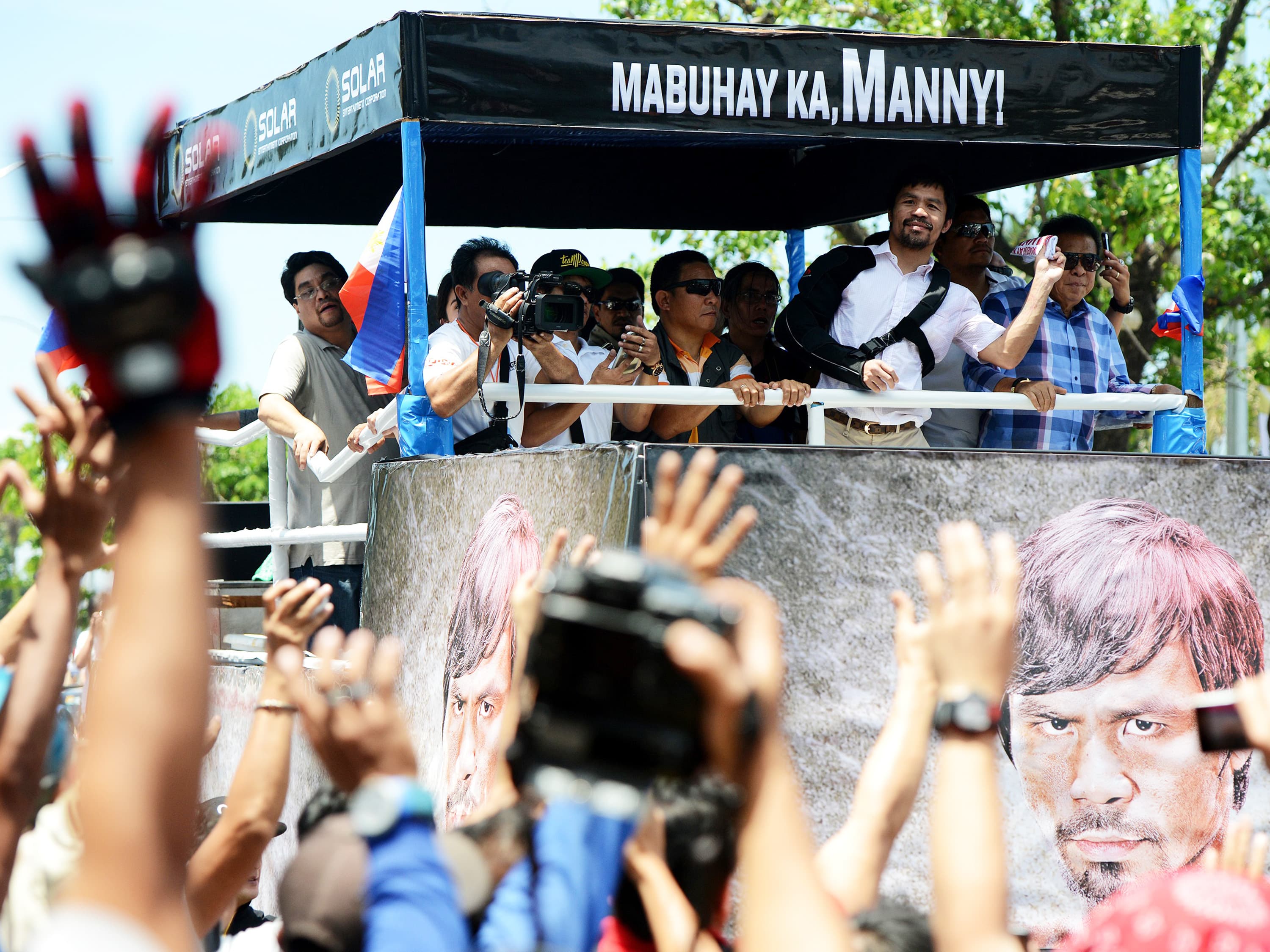 Manny Pacquiao durante um desfile de boas-vindas em Manila, nas Filipinas