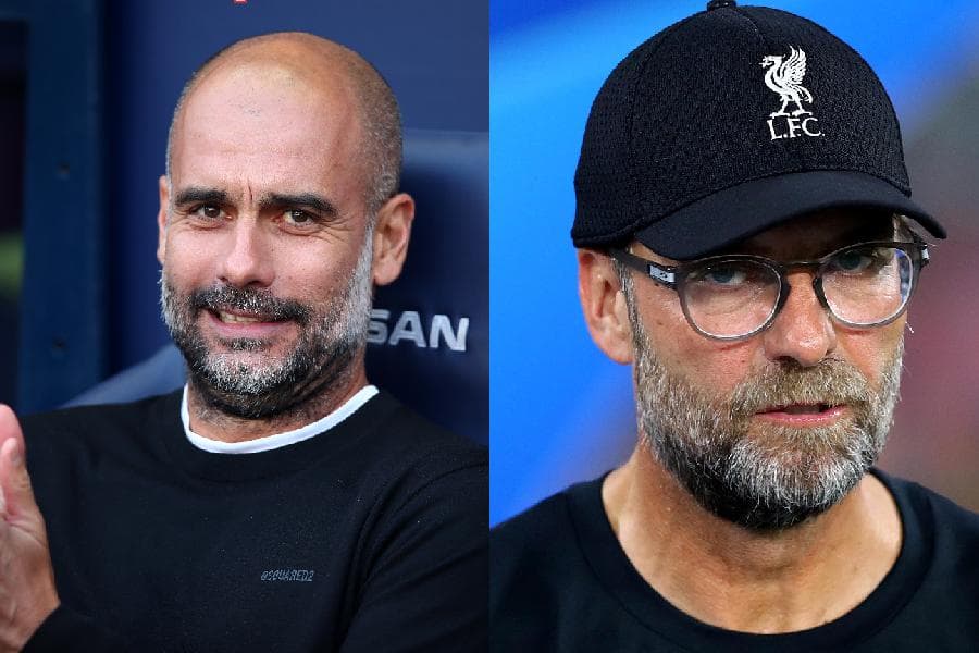 Os técnicos Pep Guardiola, do Manchester City, e Jürgen Klopp, do Liverpool