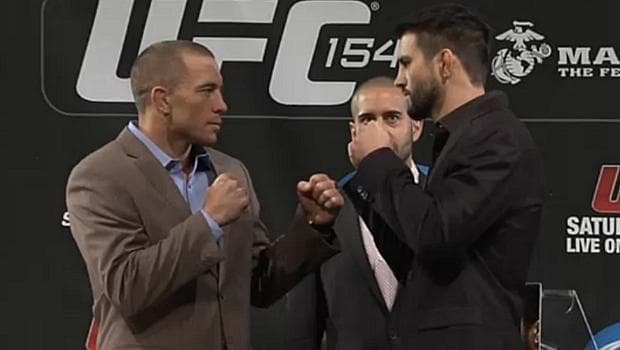 Georges Saint-Pierre (à esq.) e Carlos Condit durante a coletiva para o UFC 154