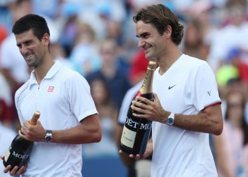 Federer e Djokovic no final da partida