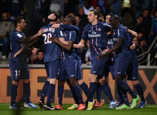 Jogadores do PSG comemoram o título