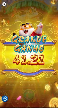 Tela do jogo Fortune Tiger exibindo o texto "Grande Ganho" com o valor do prêmio e animações douradas.