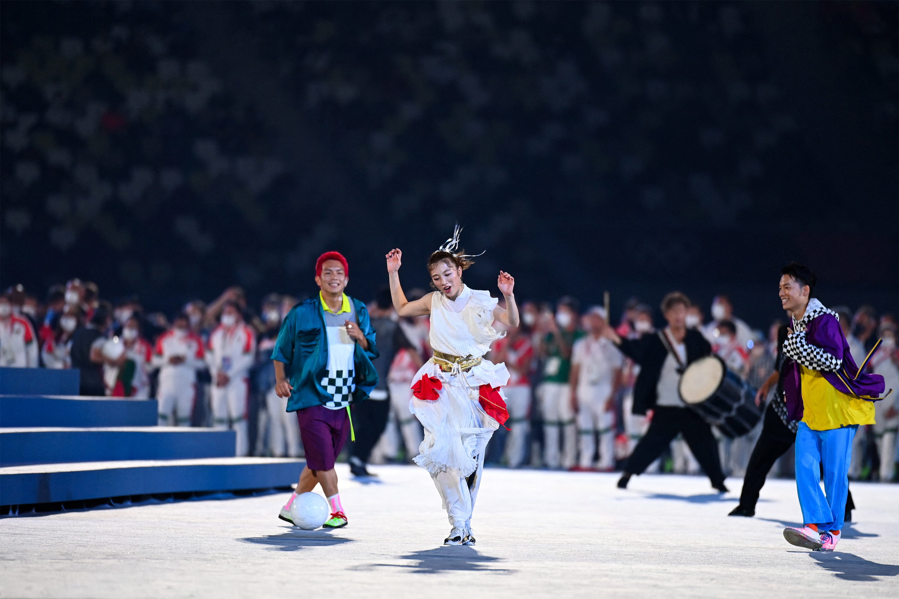 Dancers and musicians perform during the closing ceremony of the Tokyo 2020 Olympic Games, at the Olympic Stadium, in Tokyo, on August 8, 2021. (Photo by Daniel LEAL-OLIVAS / AFP)