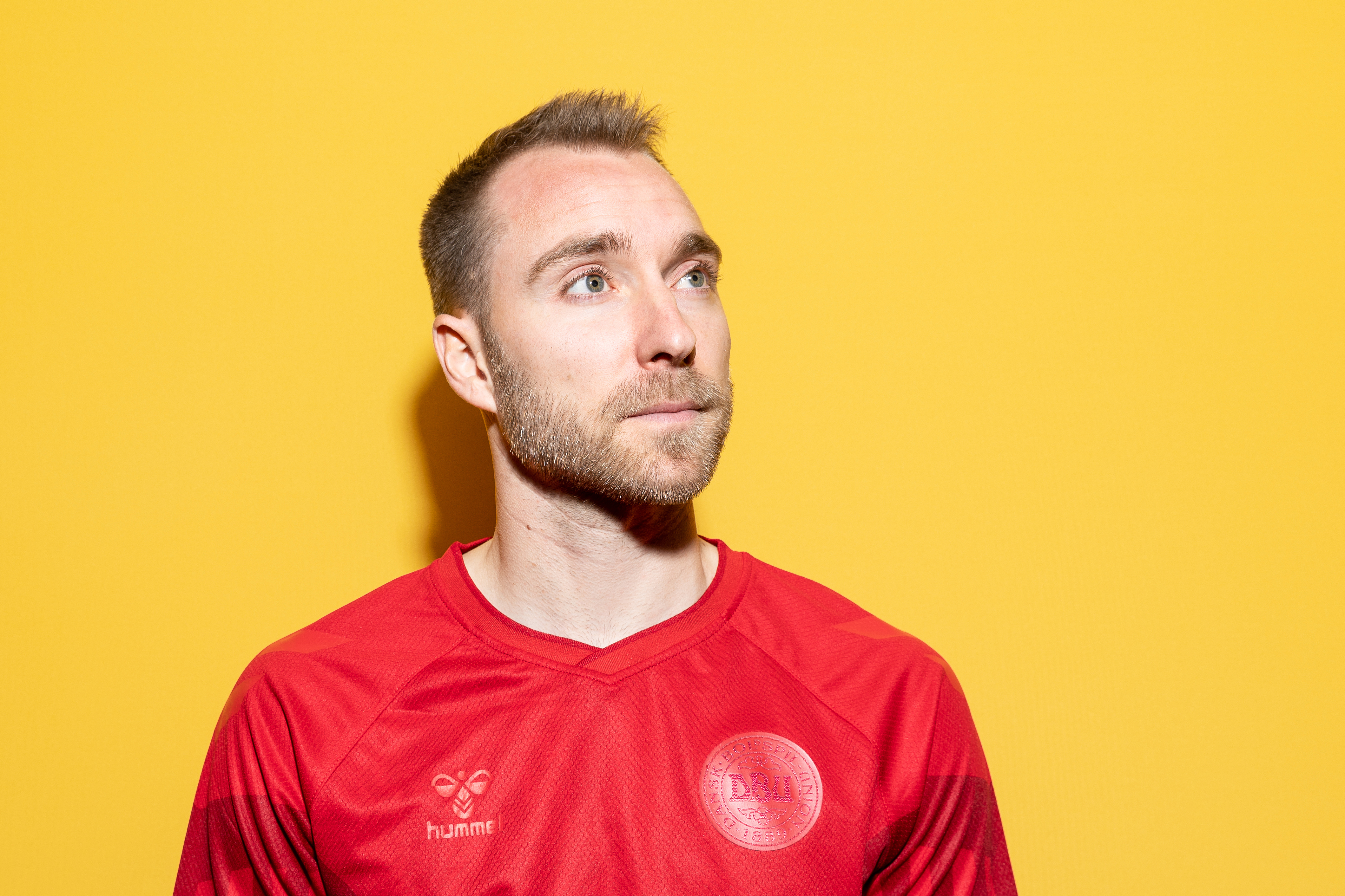 DOHA, QATAR - NOVEMBER 17: Christian Eriksen of Denmark poses during the official FIFA World Cup Qatar 2022 portrait session on November 17, 2022 in Doha, Qatar. (Photo by Maddie Meyer - FIFA/FIFA via Getty Images)