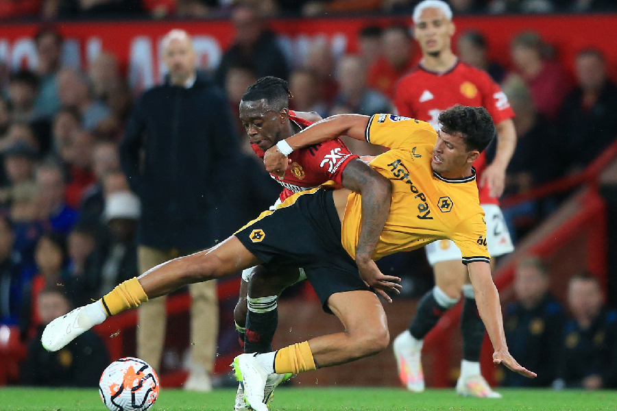 Matheus Nunes em ação diante do Manchester United - Lindsay Parnaby/AFP